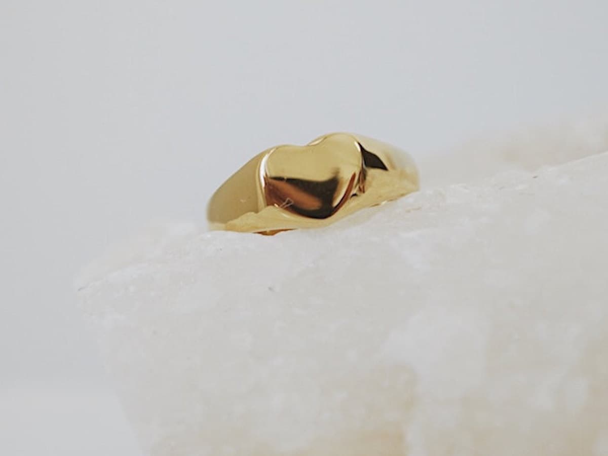 A gold heart-shaped signet ring from Foe & Dear