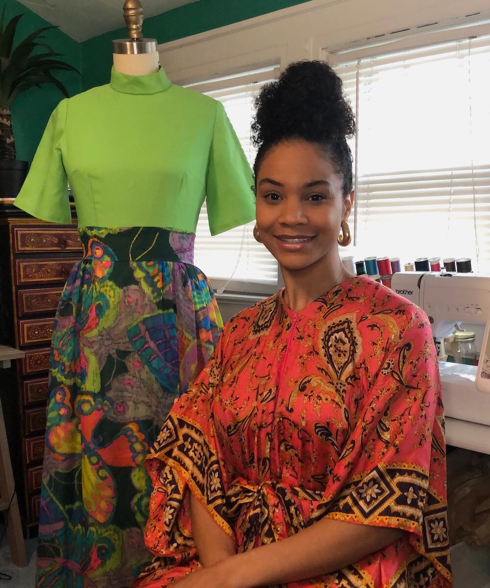 A portrait of vintage clothing seller Halima Garrett in her New Jersey studio.