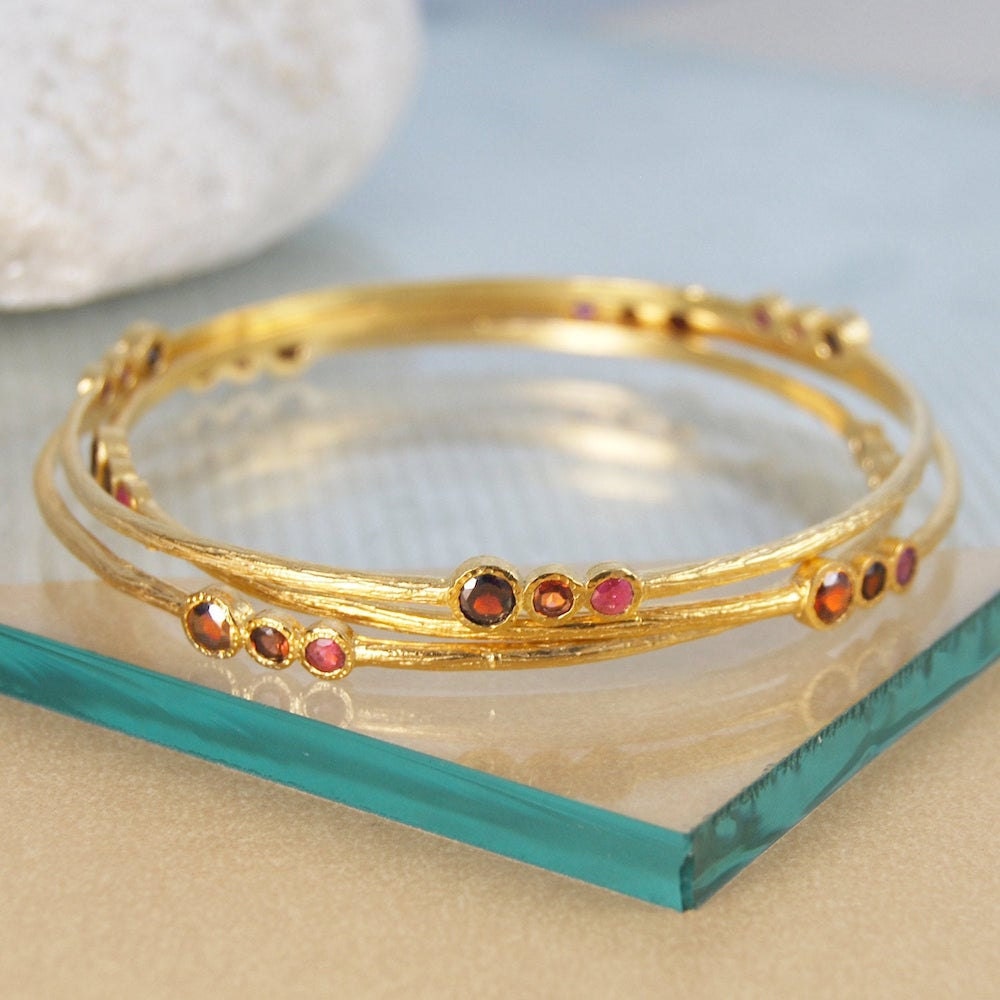 Ruby and garnet bangle from Embers Gemstone Jewellery