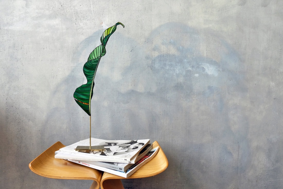 A stained-glass banana leaf suncatcher by Elena Zaycman