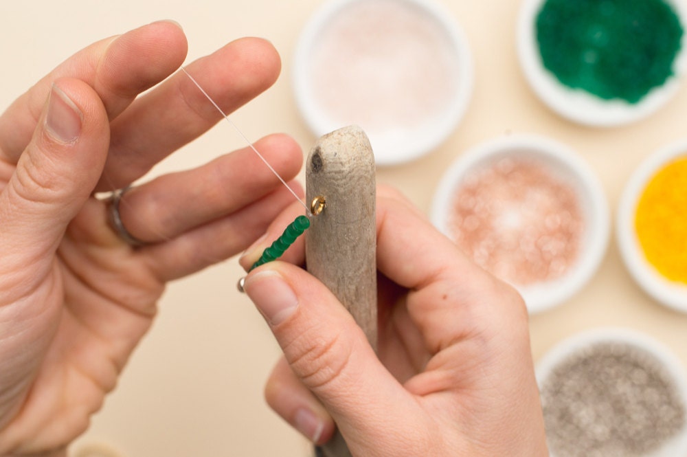 Tying the loose end of the finishing line onto the second eye hook