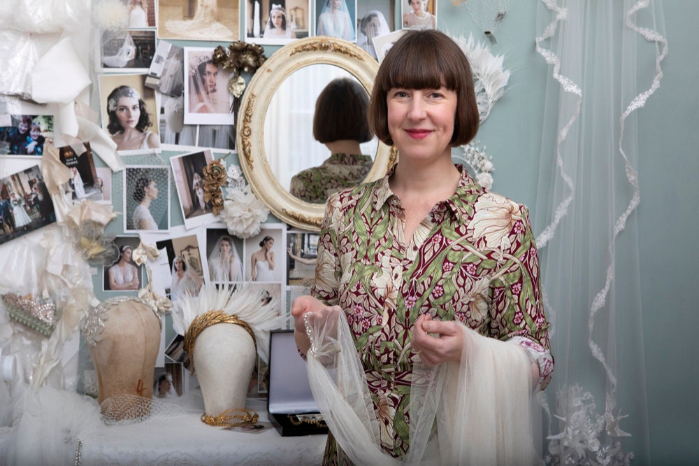 Portrait of Agnes Hart bridal headpiece designer Rae Birch Carter in her studio