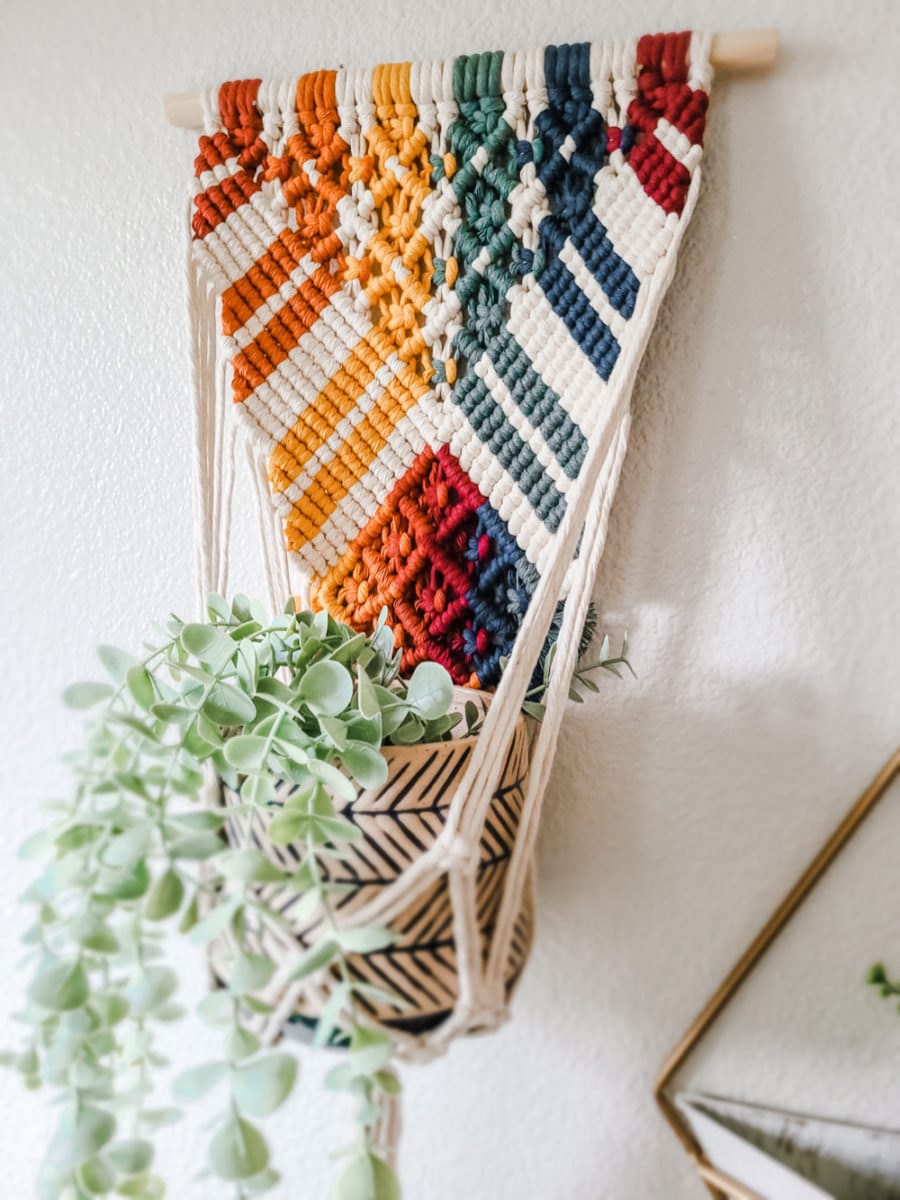 A rainbow hanging planter from Sweet Home Alberti.