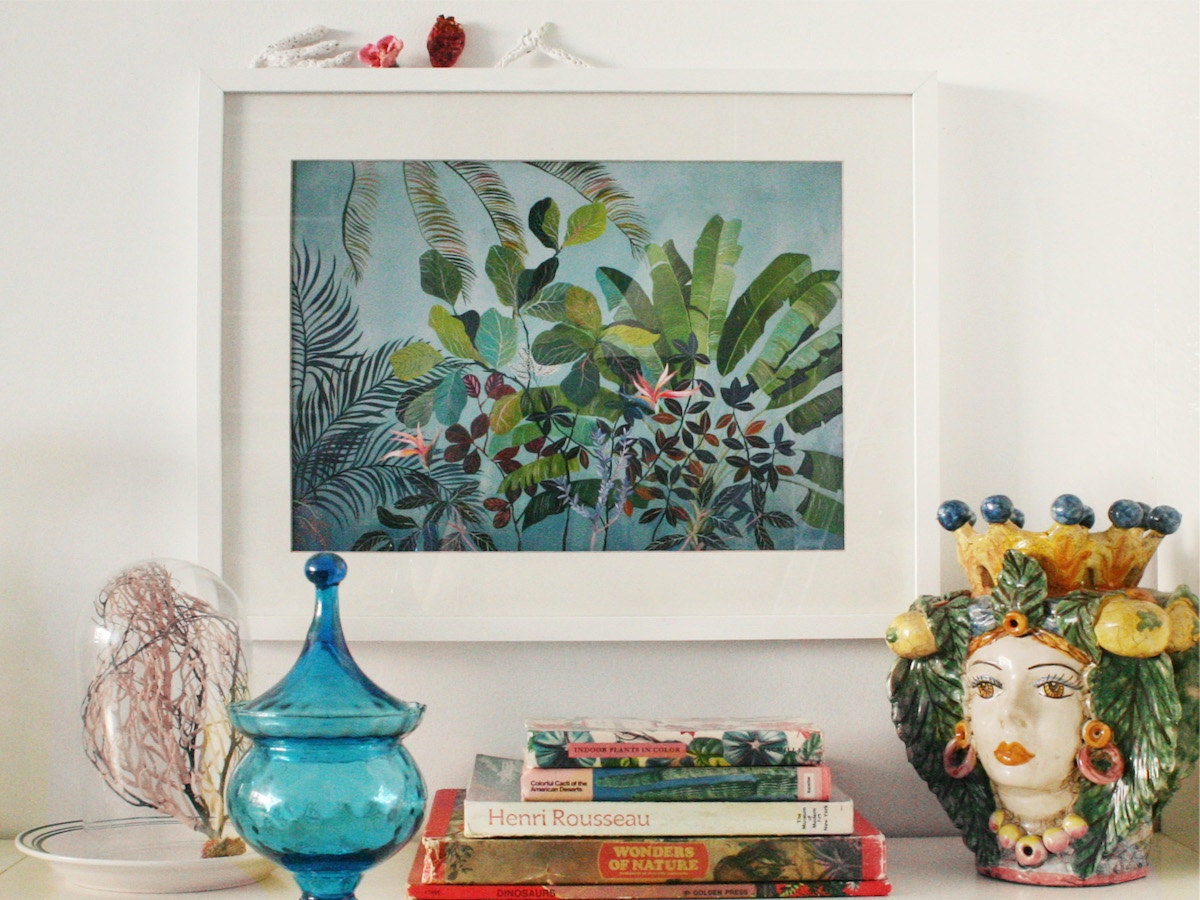 A framed botanical print from Art and People, styled and hanging on the wall.