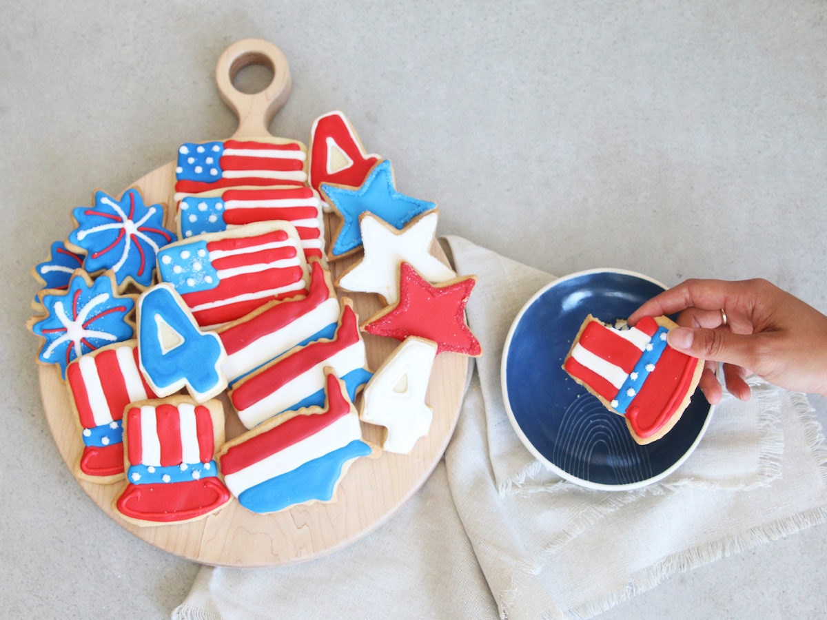 Assorted red, white, and blue-frosted Fourth of July cookies from Sugar & Flour