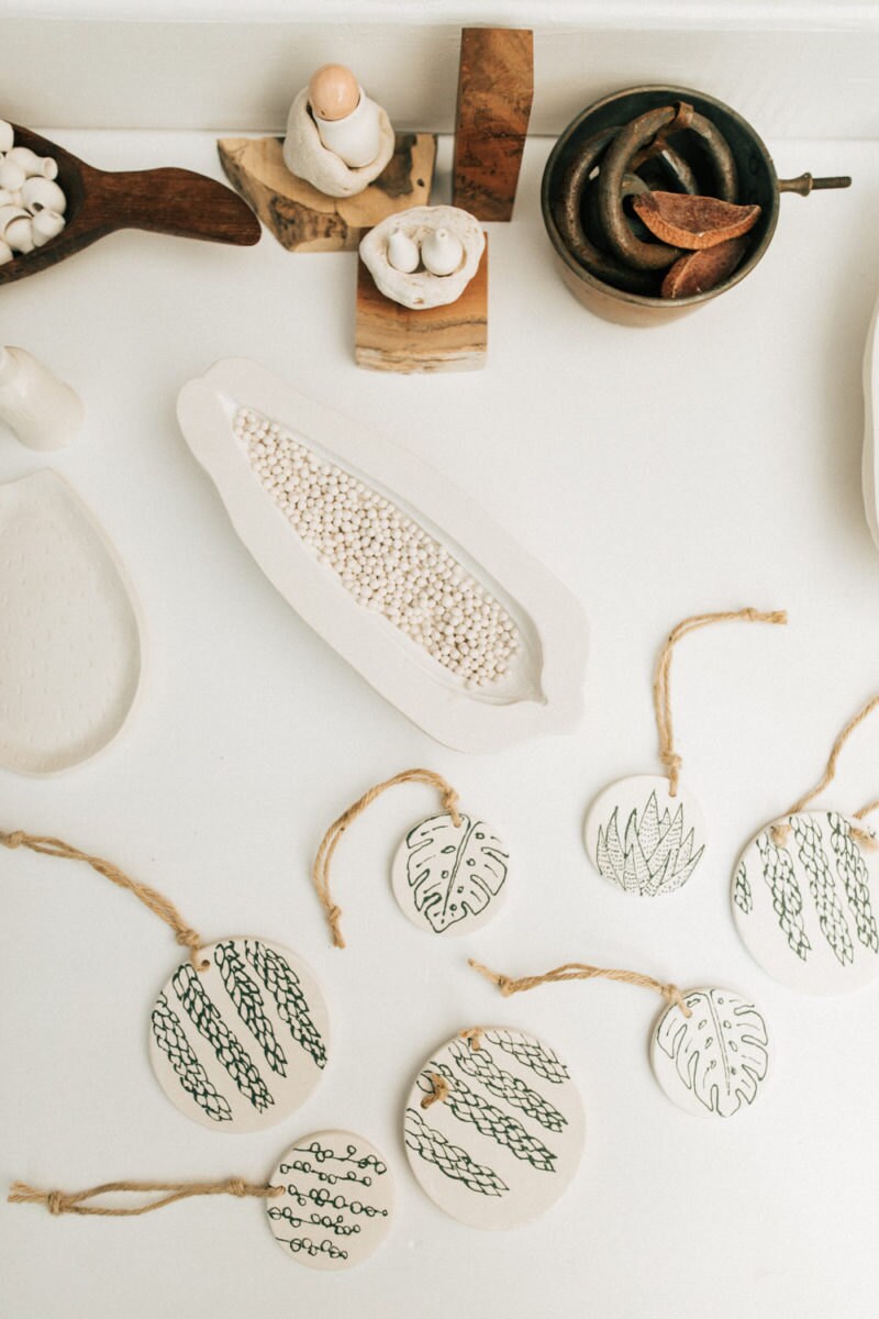 A collection of Sally's ceramic pieces laid out on a table