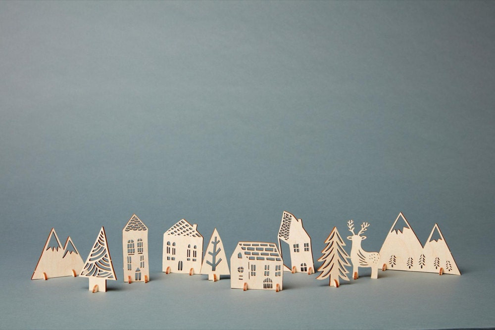 Pop-out 3-D wooden winter village from Light + Paper