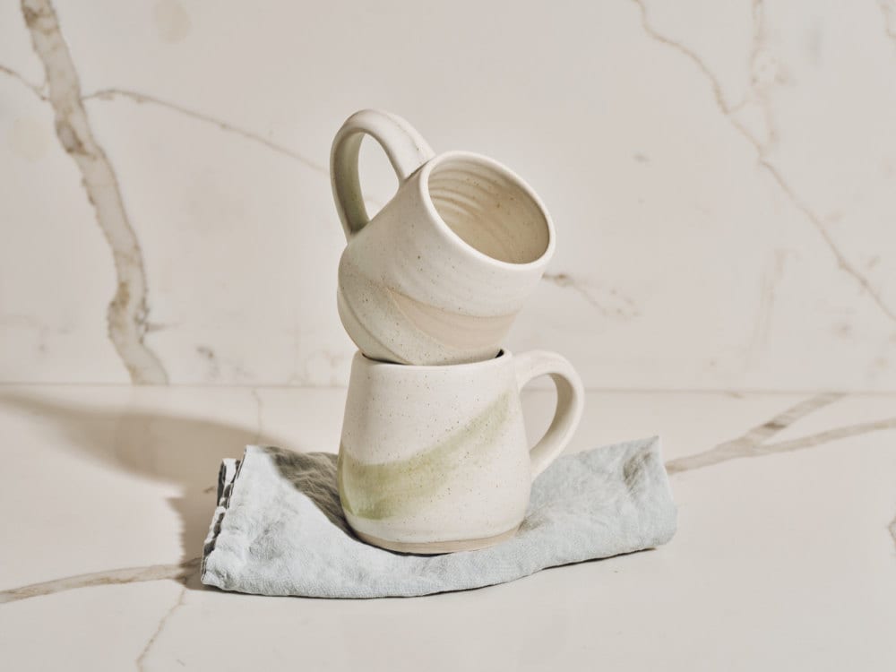 Stacked stoneware wabi-sabi mugs from the Tan France x Etsy collection