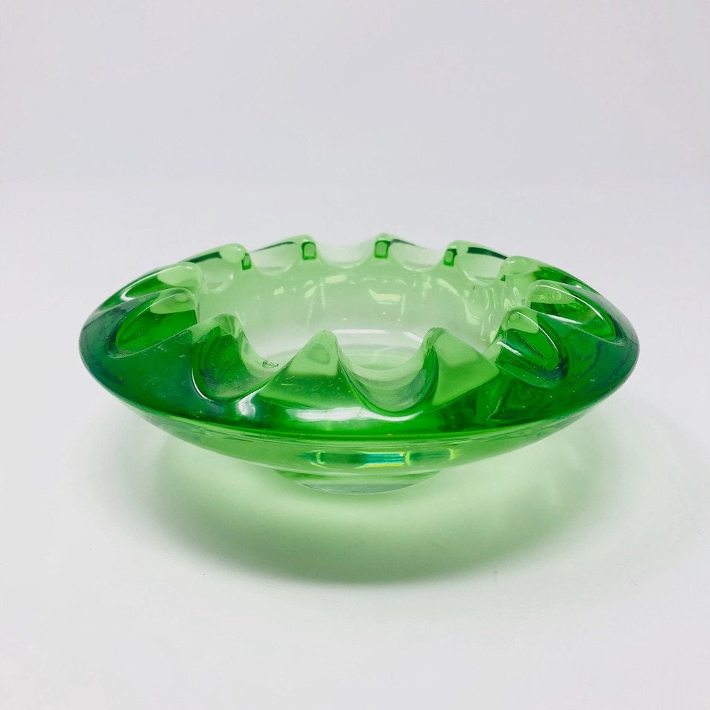 A green glass catchall from Vintage Retro Cupboard on Etsy
