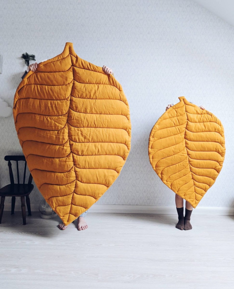 Leaf-shaped rugs from Etsy seller OMOLOKO