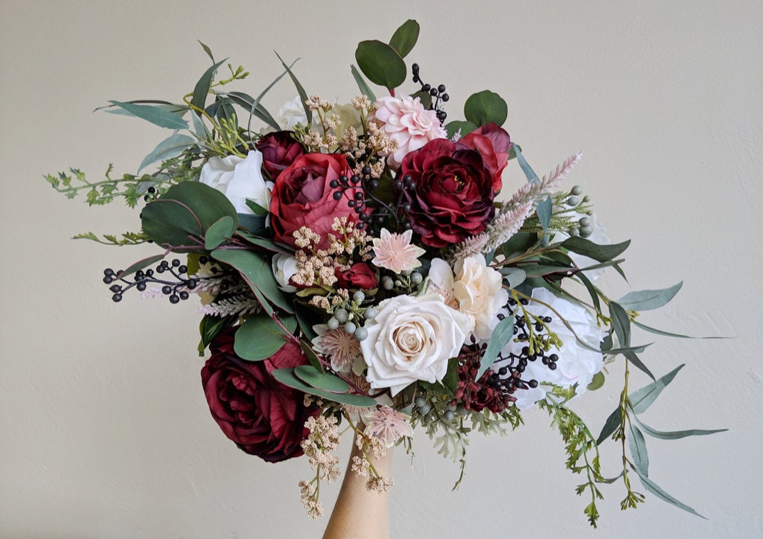 An example of a lush, wild red and pink faux bouquet from The Faux Bouquets
