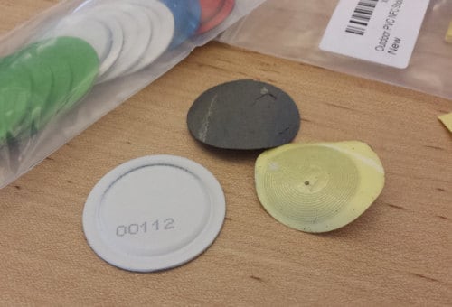 Removing anti-metal backing from NFC tags