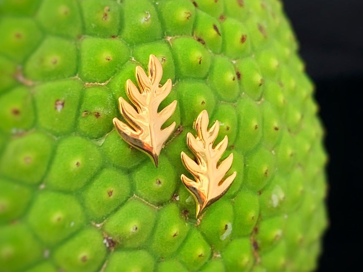 Gold ulu leaf earrings from Te Hotu Mana