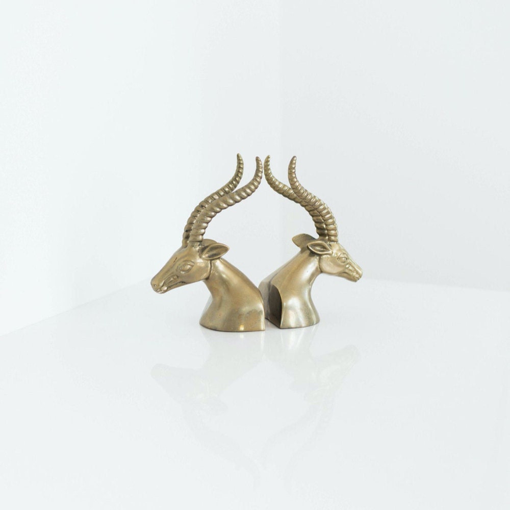Vintage brass gazelle head bookends from Otherwise Shoppe