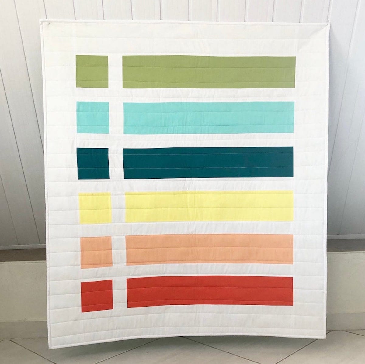A colorful baby quilt kit from Etsy