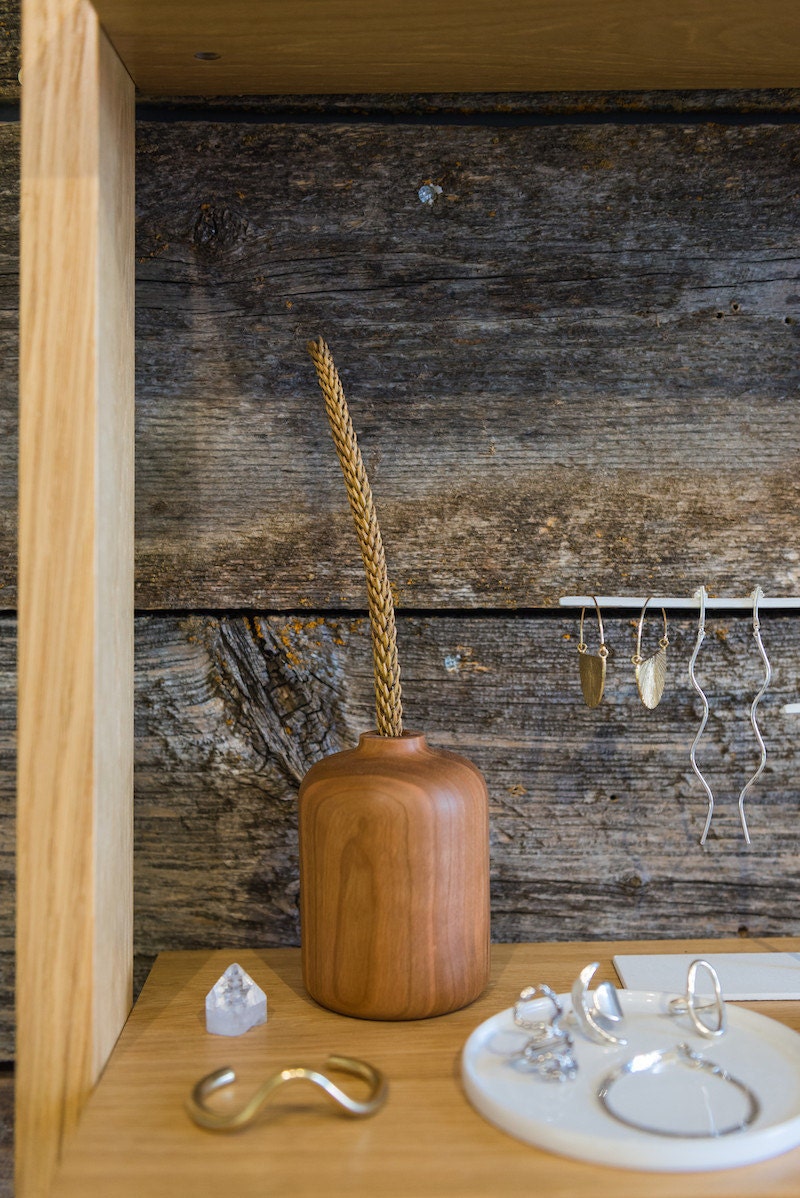 Hardwood bud vase from Melanie Abrantes on display at Crown Nine