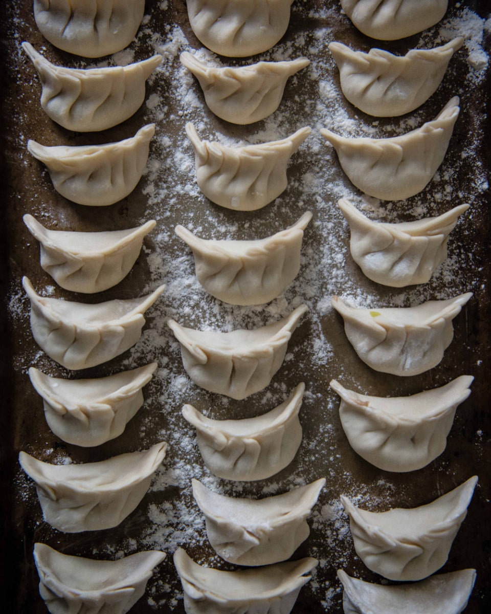 Dumplings arrayed on a tray Dumplings arrayed on a tray
