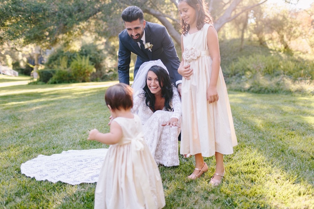 Talisa and David with their daughters on their wedding day