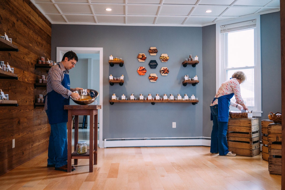 Robert and Autum keeping busy in their storefront workspace