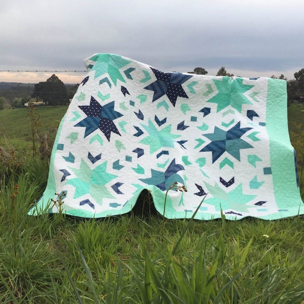 A starflower quilt pattern from Etsy