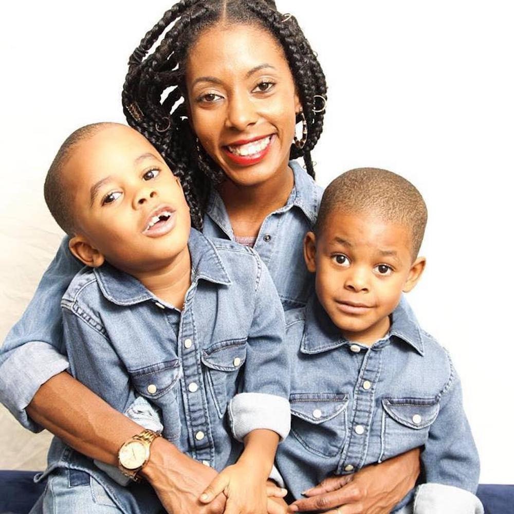 A portrait of Etsy Internal Events Specialist Sheyenne Brown and her two sons