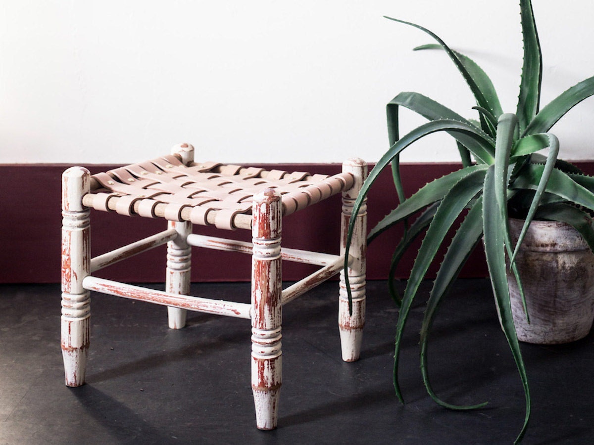 Finished up-cycled leather stool, made by Naomi Huober