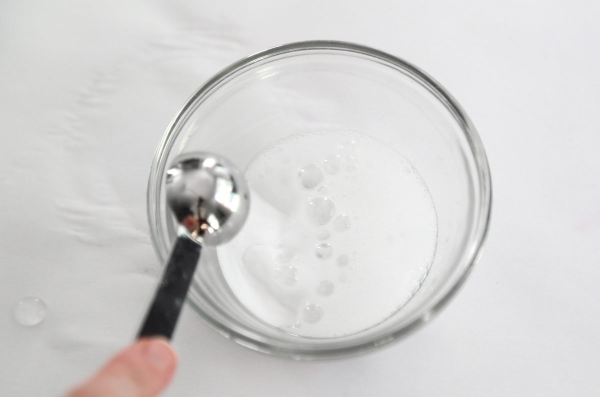 Combine baking soda and vinegar