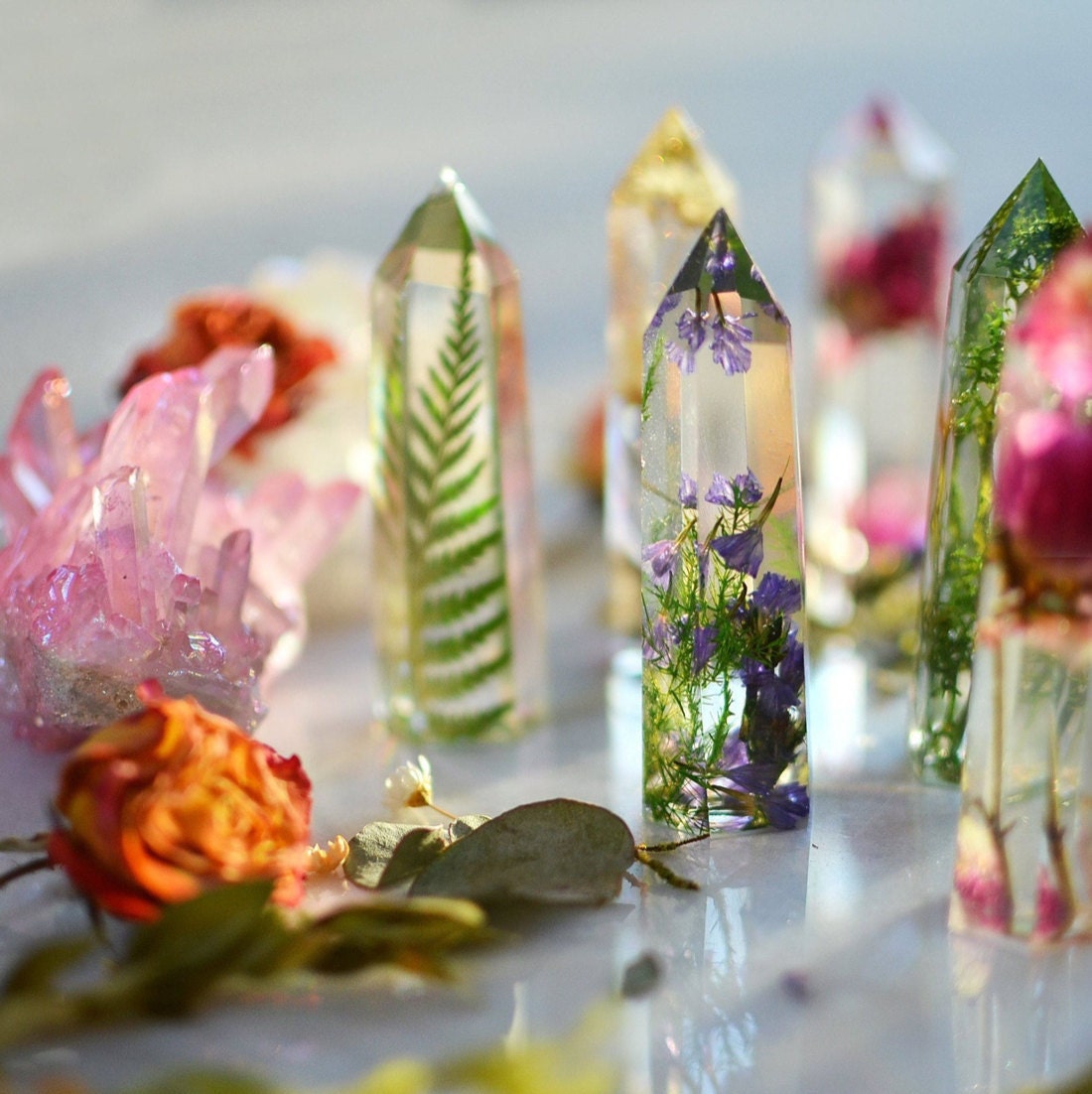 A collection of flower-filled resin crystals from Eight Acorns