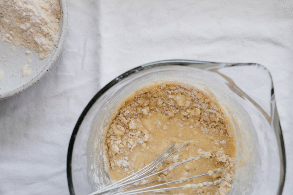 Combining the sugar and the wet ingredients Combining the sugar and the wet ingredients