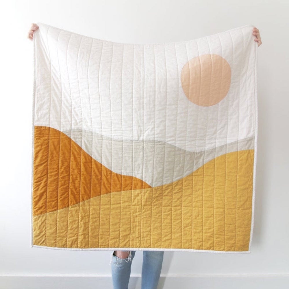 A desert landscape quilt from Kindred Quilting Co.