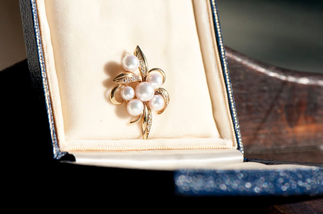 A pearl and diamond necklace pendant from KK Vintage Collection