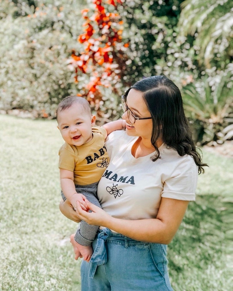 Mother and son wearing coordinated "Baby Bee" and "Mama Bee" T-shirt from Nature Supply Co.