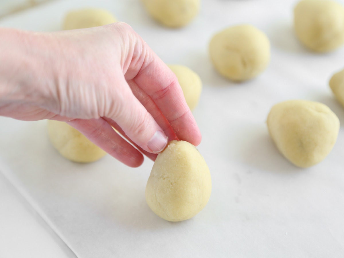 Form pinecone base using almond paste