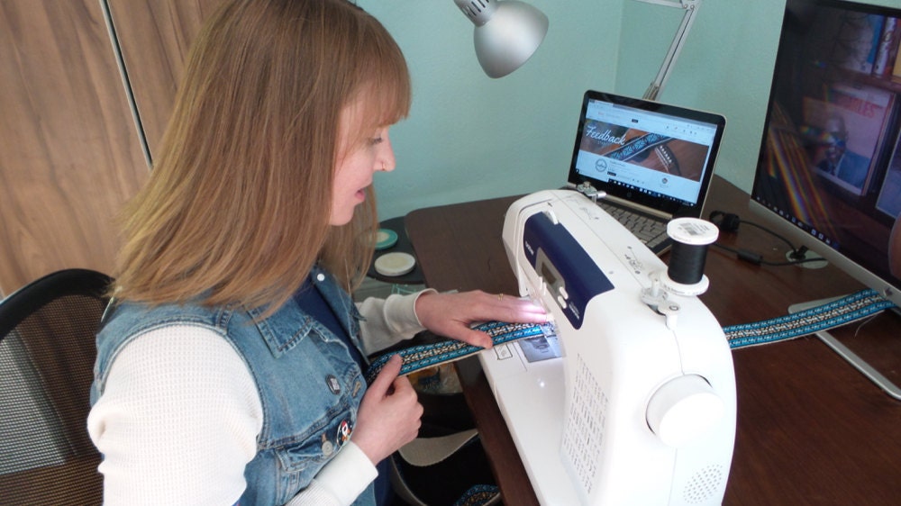 Sewing at her desk