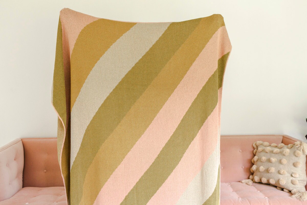 Throw blanket from the A Beautiful Mess x Etsy collection