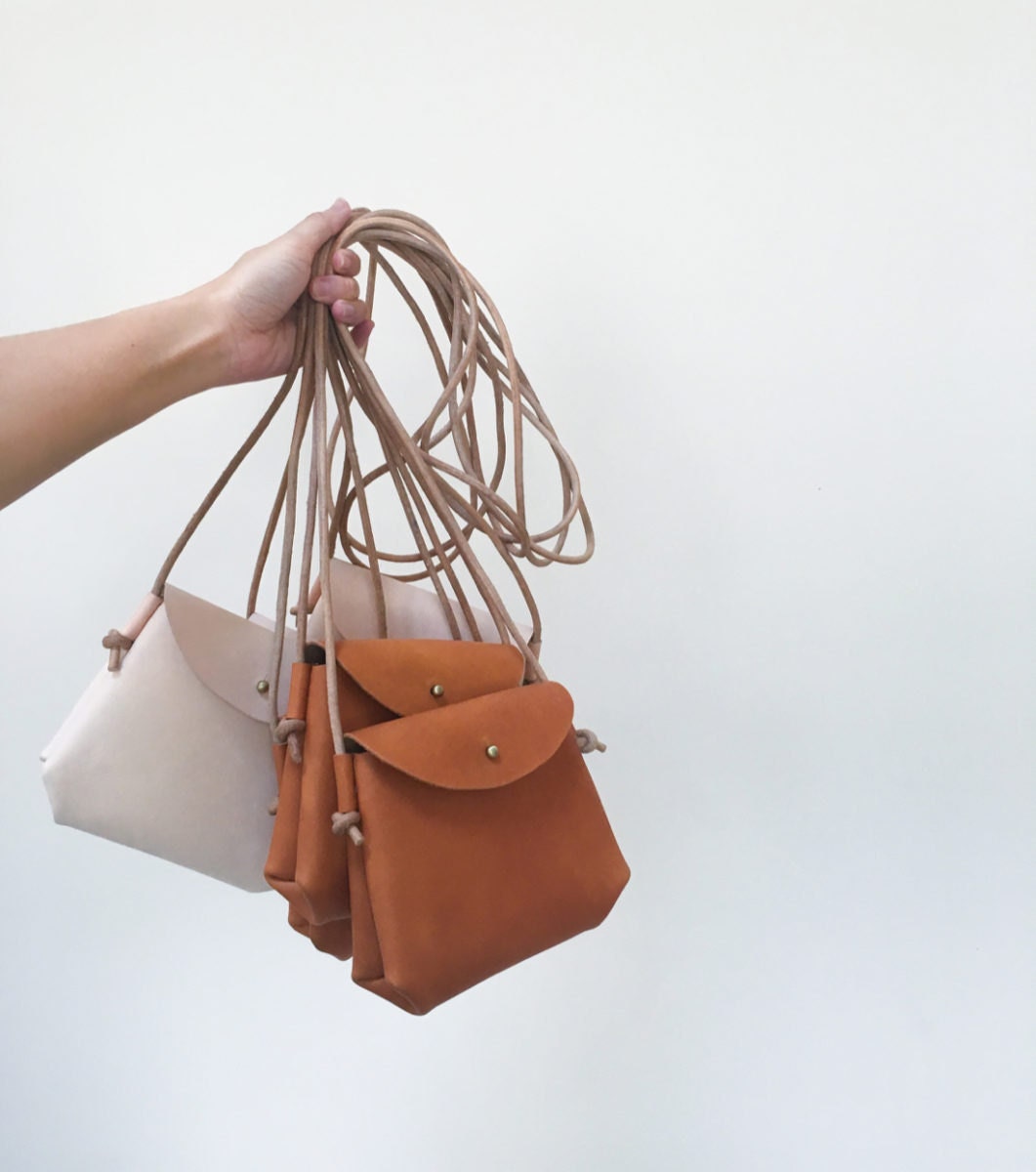 Assorted leather handbags from Small Queue