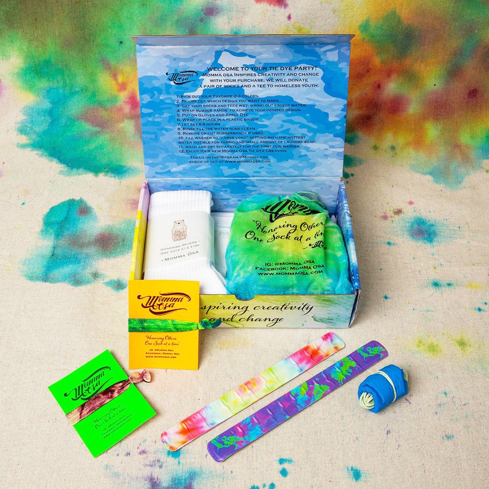 A colorful kit for making tie-dye socks and a T-shirt