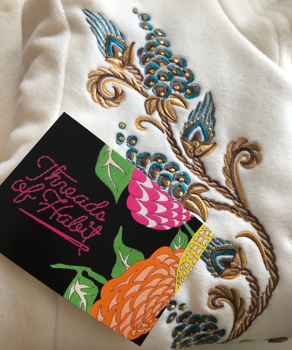 A Threads of Habit thank you card packaged in with a ready-to-ship vintage garment.