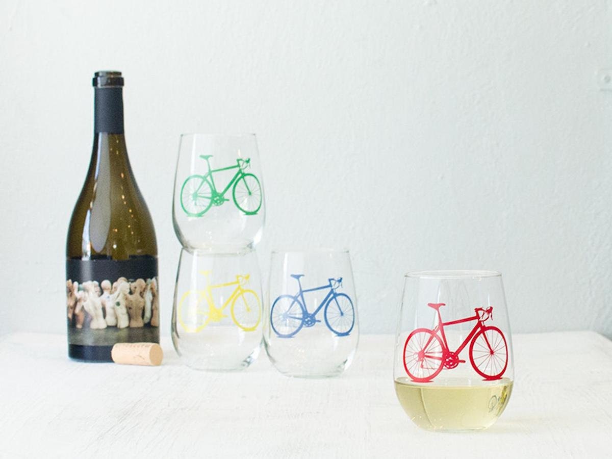 Stemless wine glasses with bicycle motif on Etsy