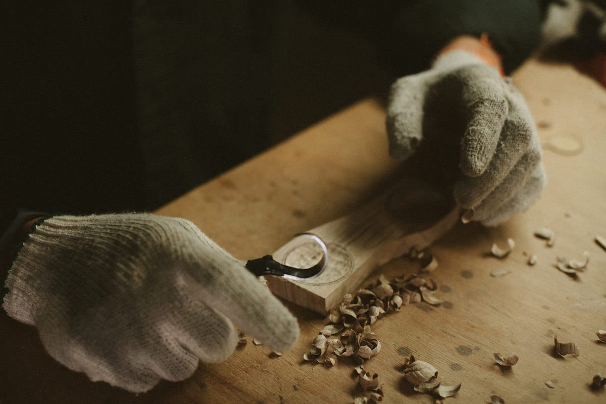 Close-up shot of Kirill carving