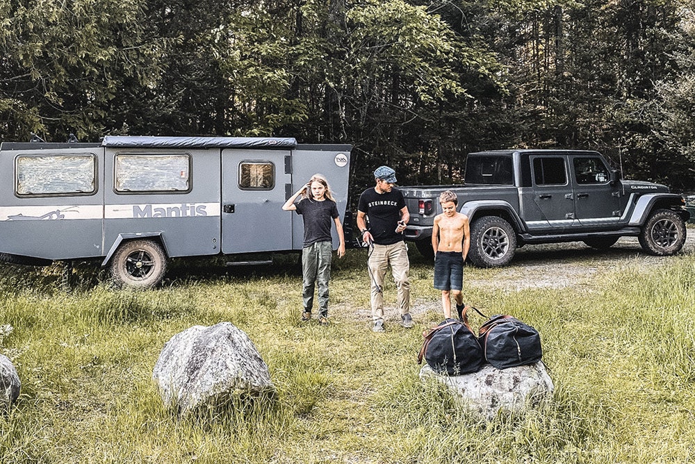 A candid family photo outside Margaux and Walter's camper.