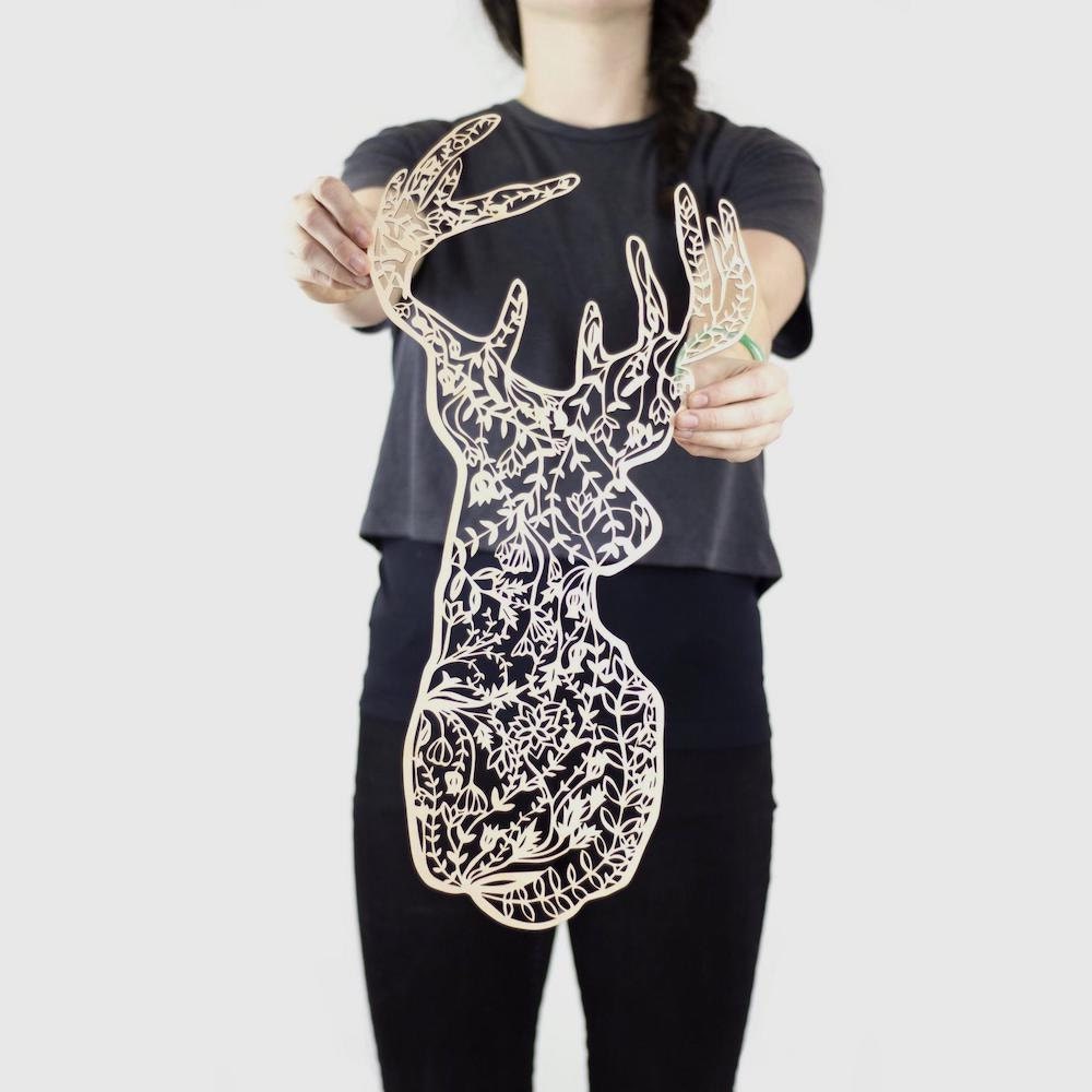 Laser-cut floral deer wall hanging from Light + Paper