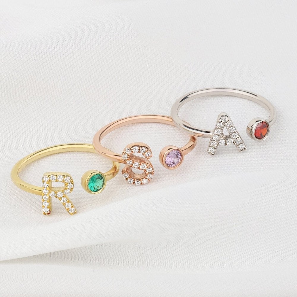 Initial birthstone rings from Golden Silver Customs on Etsy