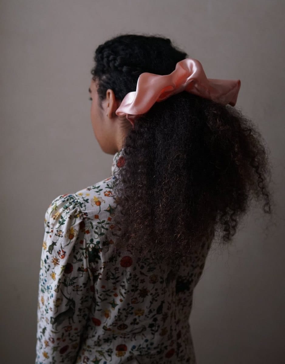 Rose-colored satin scrunchie from A Few Decades Away