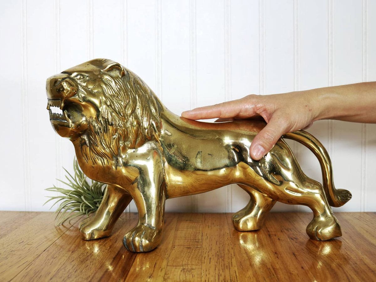 Vintage brass lion figurine from Brass Attics