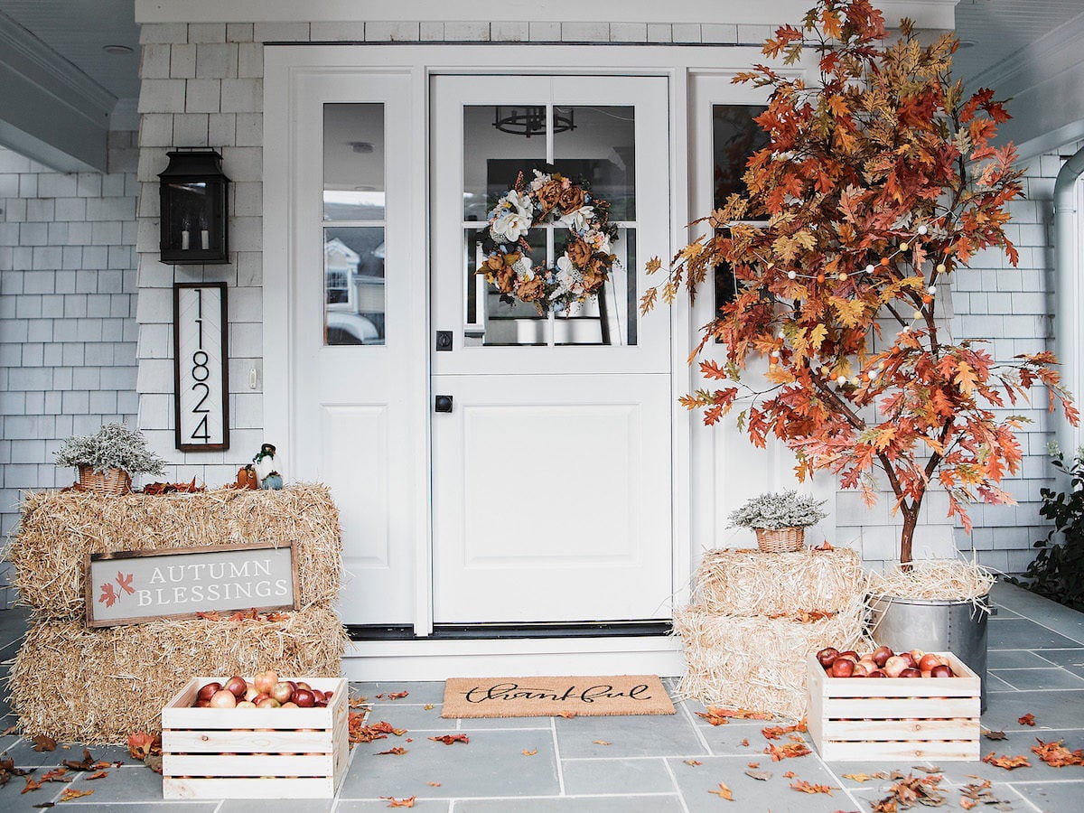 A festive front porch decorated for fall.