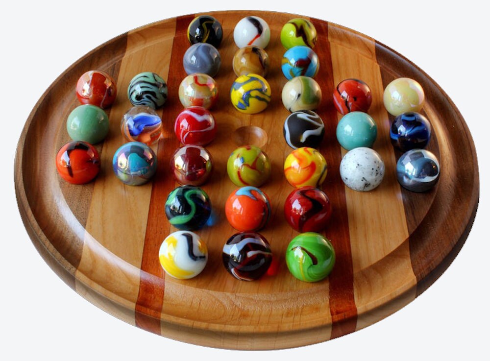 A marble solitaire board from Marble Board Games