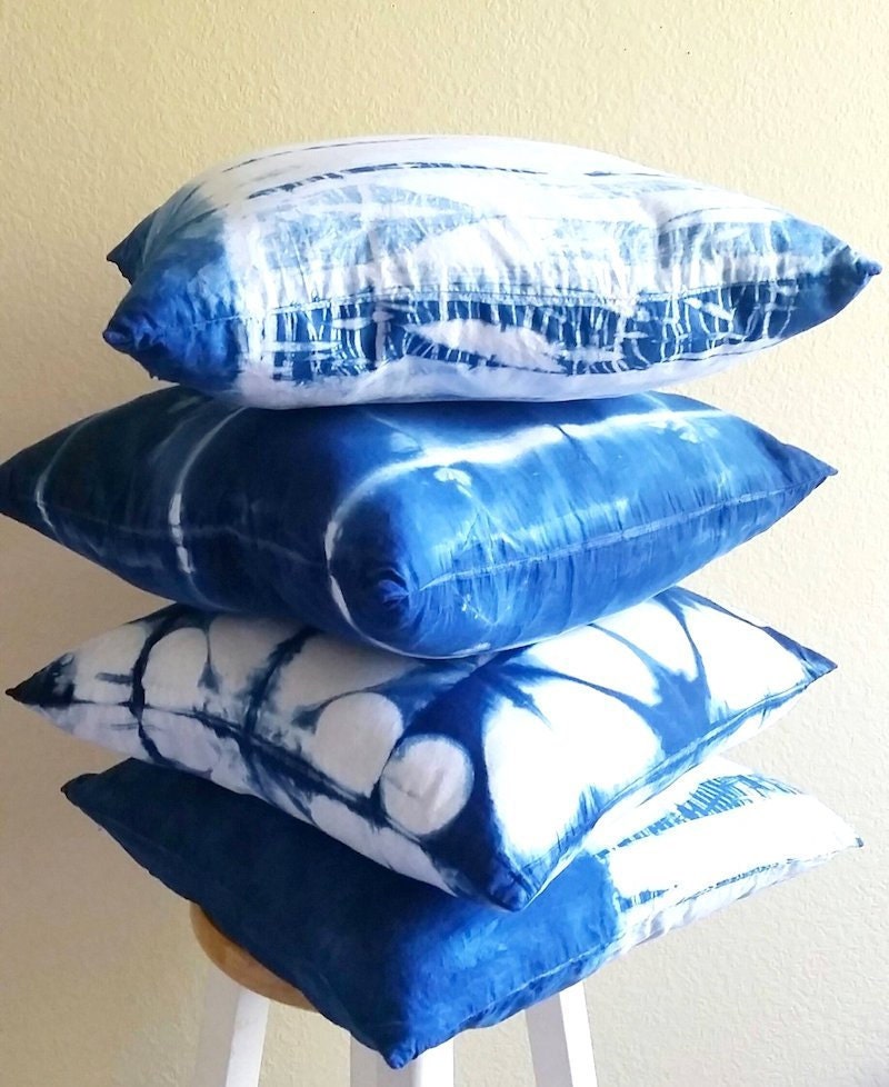 A stack of shibori-dyed pillow covers from Adroit
