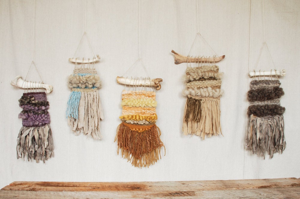 mini weavings hung on a wall