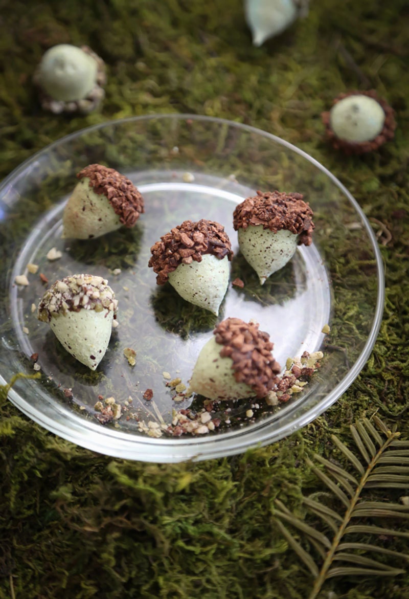 A plate of completed acorn cookies.